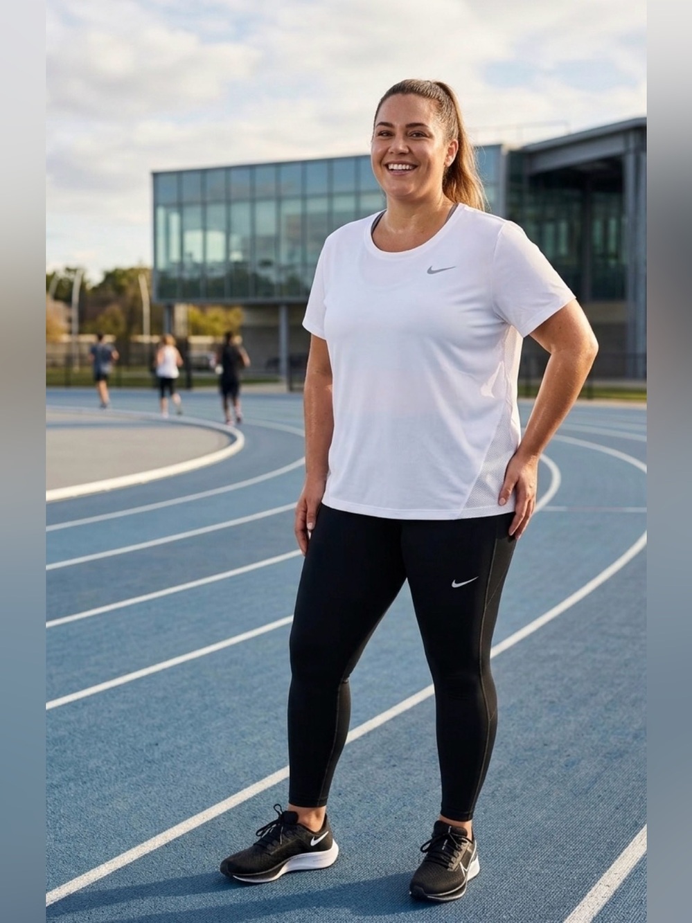 Nike Women’s White Dri-FIT Short-Sleeve Performance Tee